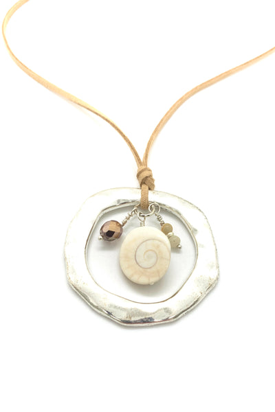 Long necklace with ring and shell charms