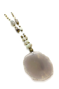 Long necklace with mineral pendant