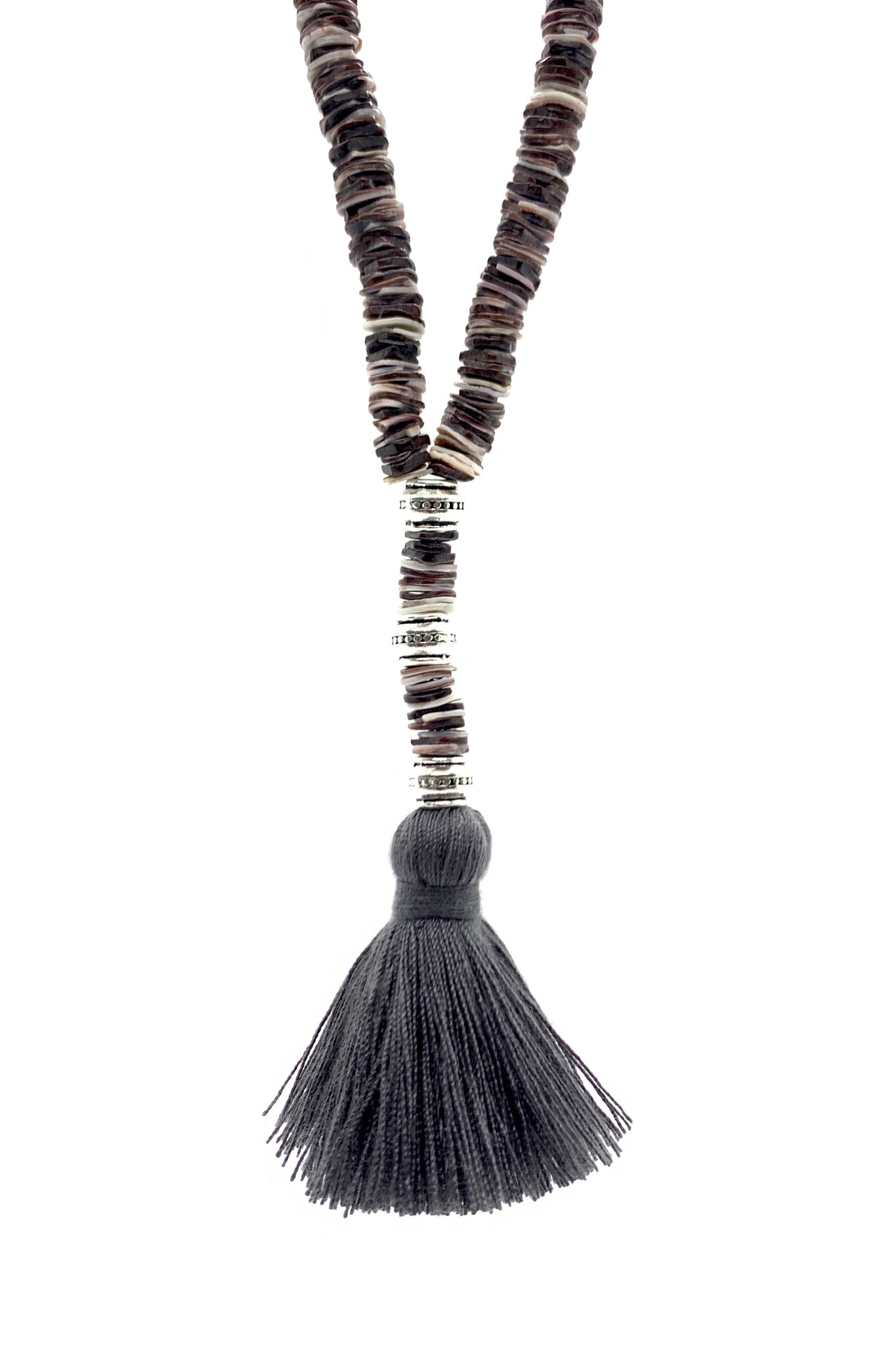 Long necklace with natural shell discs and tassel